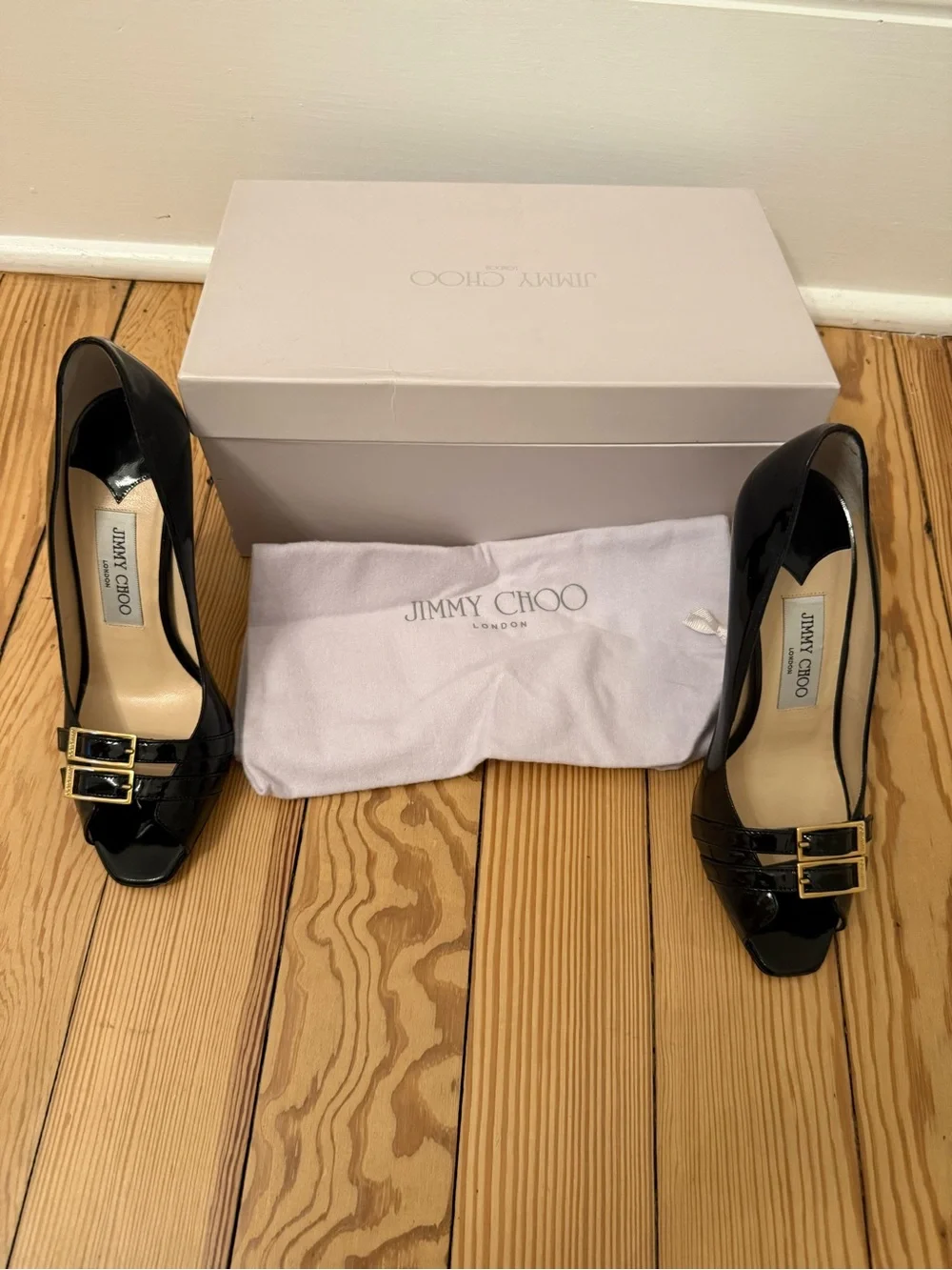 Jimmy Choo Black Patent Leather Peep-Toe Pumps with Gold Buckles